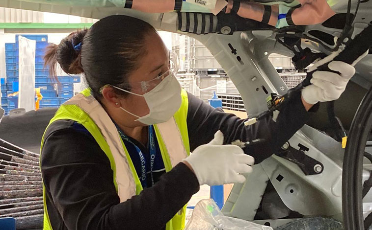 Women building Ford Mach-E